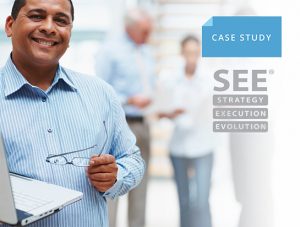 CASE STUDY graphic of man staring into camera, holding a laptop